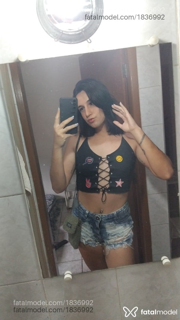 Acompanhante mulher trans com cabelo castanho de olhos pretos em Campinas - Grecco