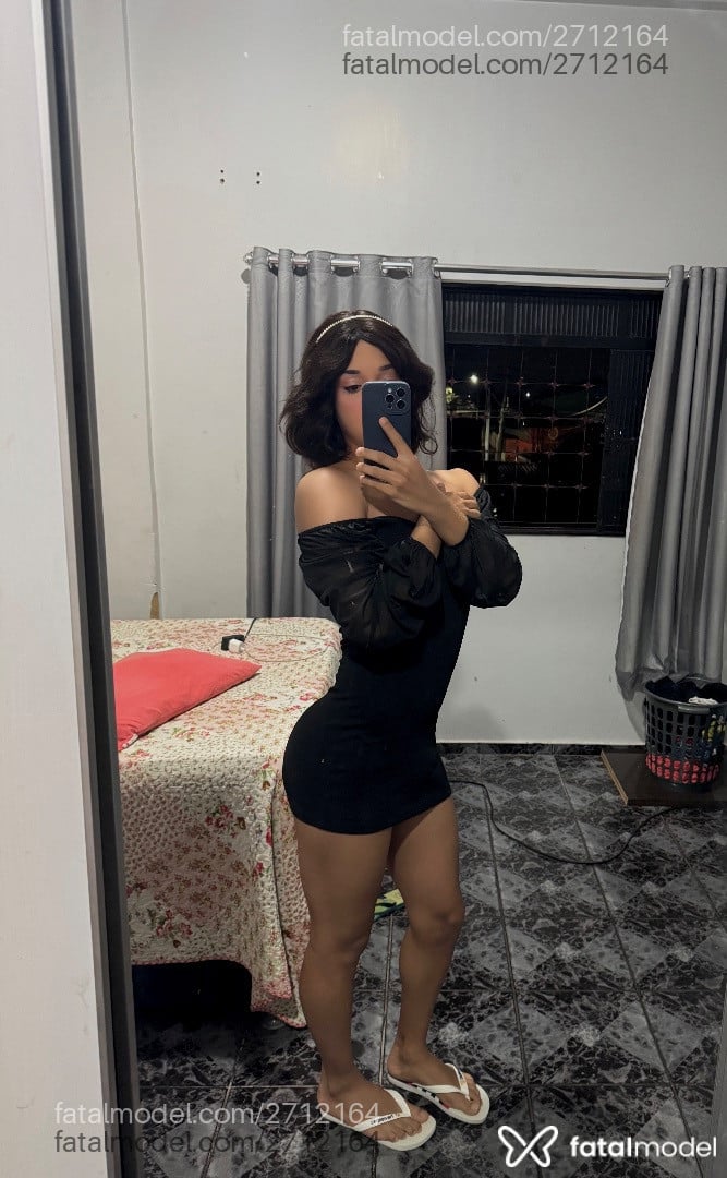 Acompanhante mulher trans com cabelo castanho de olhos castanhos em Goiânia - Welyda Dávila
