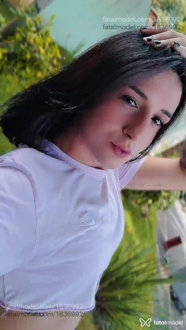 Acompanhante mulher trans com cabelo castanho de olhos pretos em Campinas - Grecco