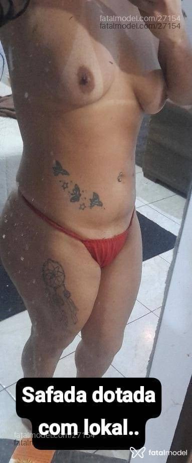 Acompanhante mulher trans morena (o) de olhos castanhos - Larissa Anaconda