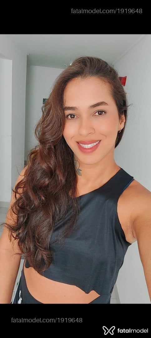 Acompanhante mulher trans com cabelo castanho de olhos castanhos em São Paulo - Julia