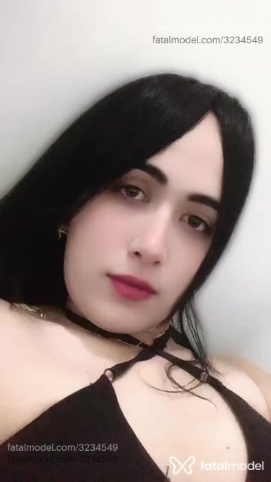Acompanhante mulher trans com cabelo castanho de olhos mel em São Paulo - Saore Alves