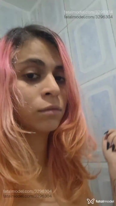 Acompanhante mulher trans com cabelo colorido de olhos castanhos em São Paulo - Alice