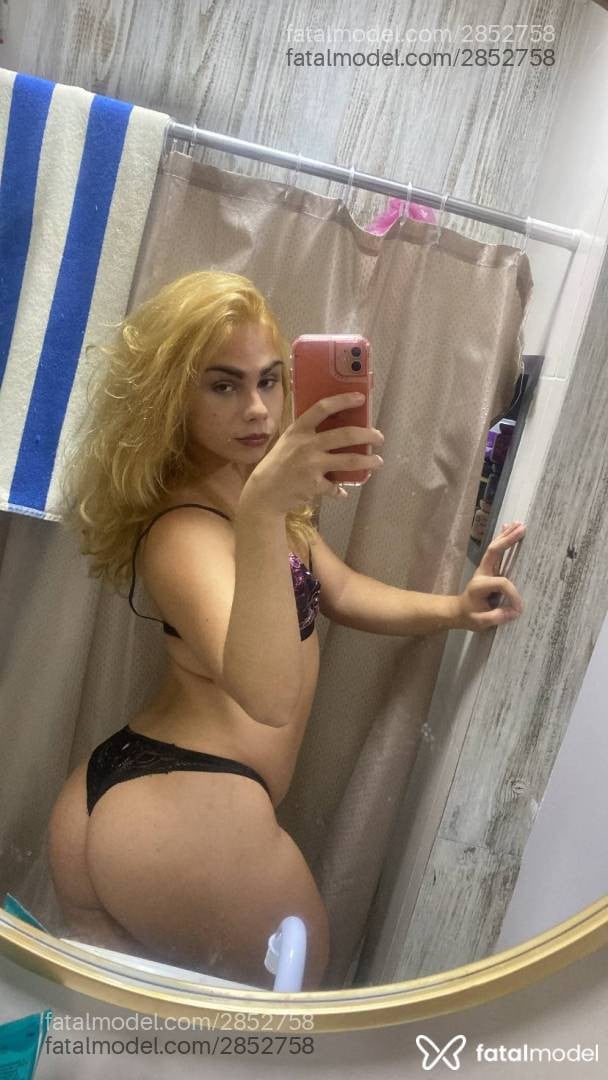 Acompanhante mulher trans com cabelo castanho de olhos castanhos - Gabriela