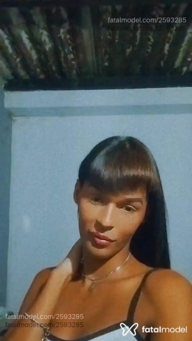 Acompanhante mulher trans com cabelo castanho de olhos pretos em Resende - Aurora