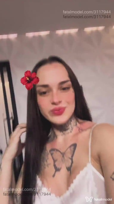 Acompanhante mulher trans com cabelo castanho de olhos mel em São Paulo - Maria Stella