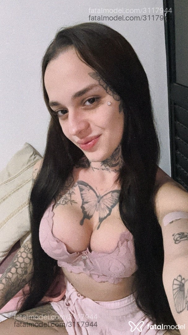 Acompanhante mulher trans com cabelo castanho de olhos mel em São Paulo - Maria Stella