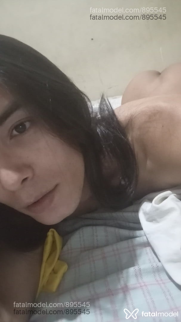 Acompanhante mulher trans com cabelo castanho de olhos pretos em Palmas - Leonina