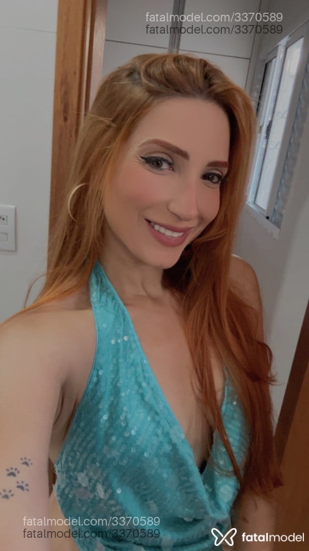 Acompanhante mulher ruiva (o) de olhos castanhos - Amber
