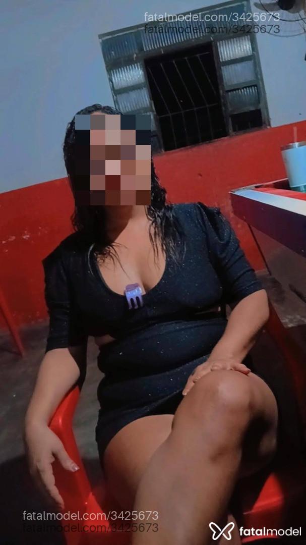 Acompanhante mulher com cabelo grisalho de olhos castanhos - Paula