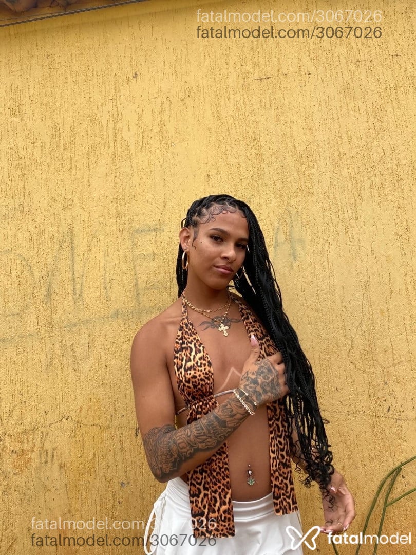 Acompanhante mulher trans com cabelo castanho de olhos castanhos em Brasília - Jade