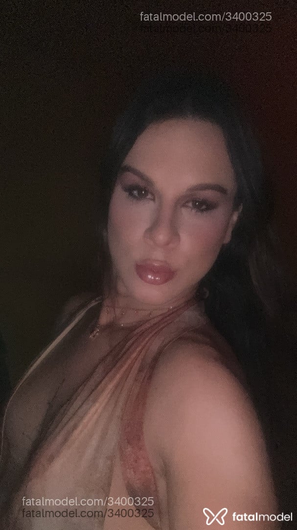 Acompanhante mulher trans com cabelo castanho de olhos castanhos em Araguaína - Laura