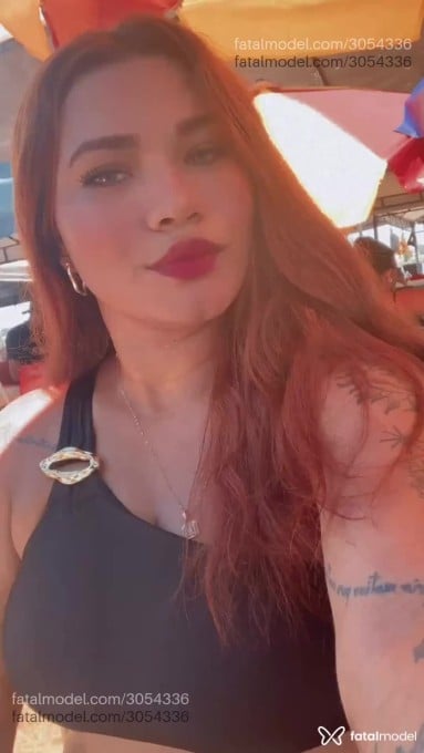 Acompanhante mulher ruiva (o) de olhos castanhos - Júlia