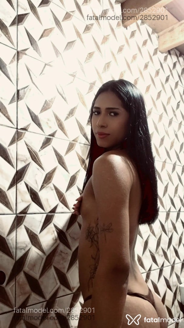 Acompanhante mulher trans morena (o) de olhos castanhos - Rafaella Duarte
