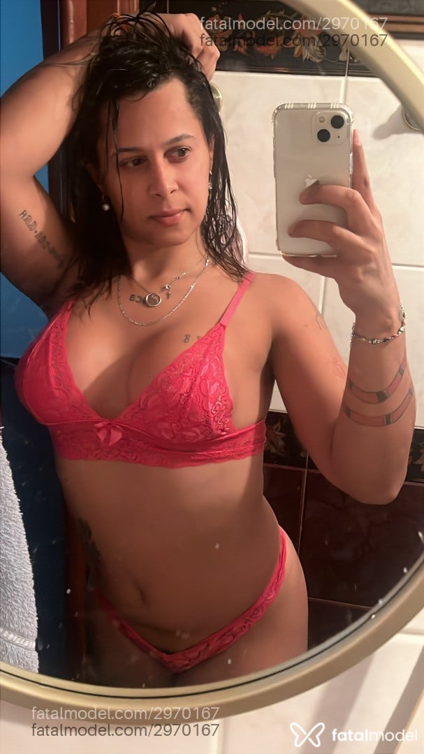 Acompanhante mulher trans com cabelo castanho de olhos castanhos - Ruca Amorim