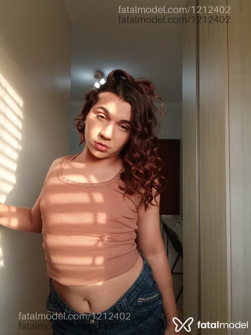 Acompanhante travesti com cabelo castanho de olhos castanhos - Gabriela Andrade