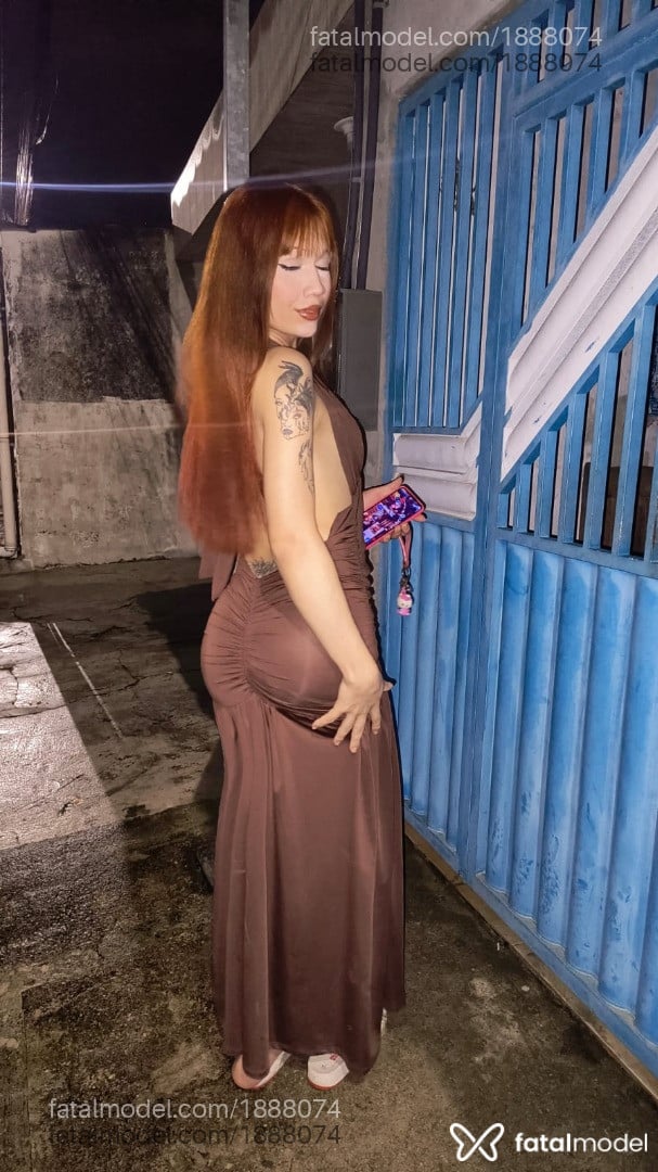 Acompanhante mulher trans ruiva (o) de olhos mel - Yara Santiago