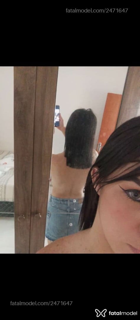 Acompanhante mulher trans com cabelo castanho de olhos verdes - Luanny Moura