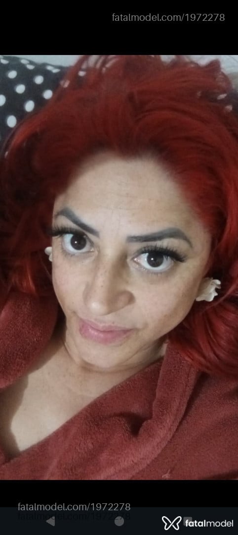 Acompanhante mulher ruiva (o) de olhos pretos - Laura warrior