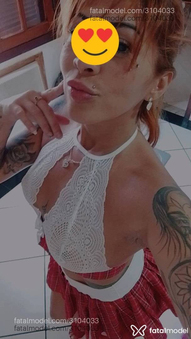 Acompanhante mulher ruiva (o) de olhos castanhos - Carmem Smith