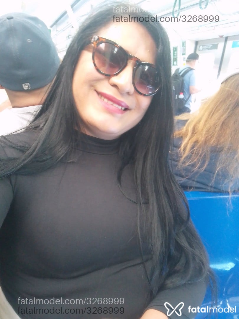 Acompanhante mulher trans morena (o) de olhos pretos - Nandinha