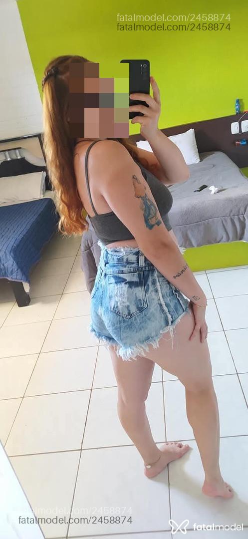 Acompanhante mulher ruiva (o) de olhos verdes - Mia Dias