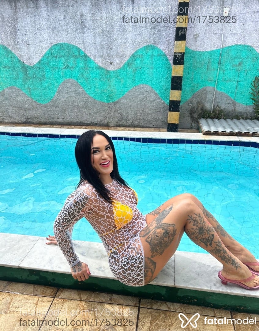 Acompanhante mulher trans morena (o) de olhos pretos - Gisele Brandão