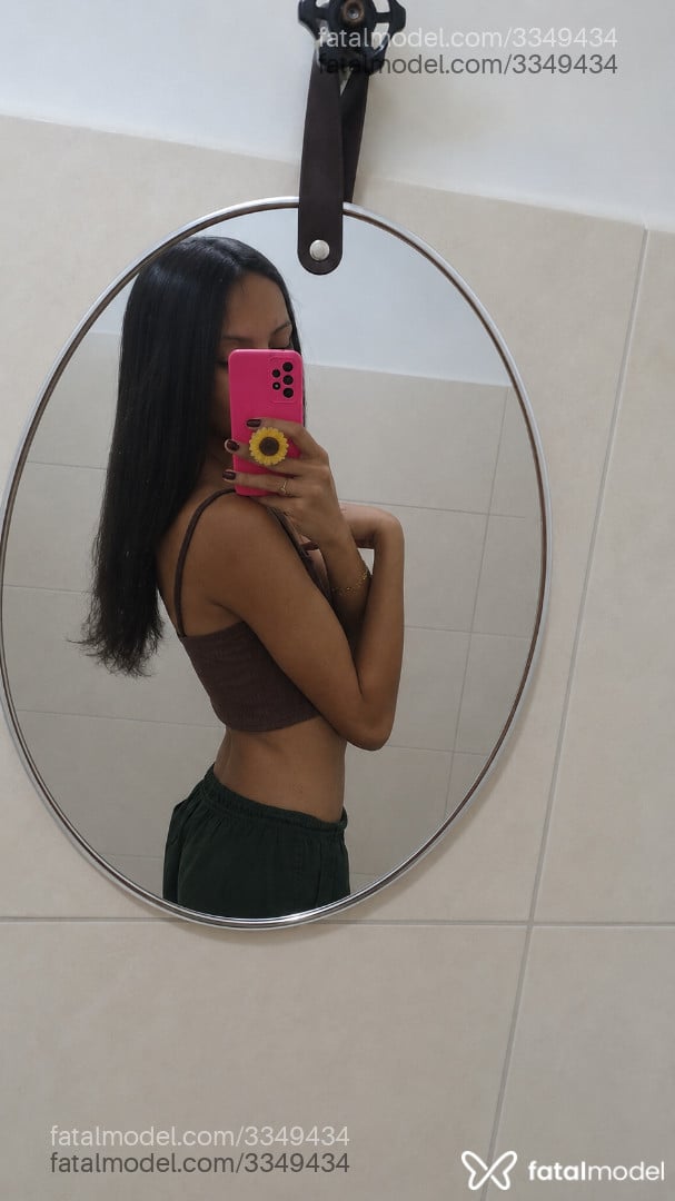 Acompanhante mulher trans com cabelo castanho de olhos castanhos - Gabryela
