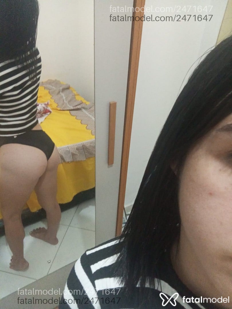 Acompanhante mulher trans com cabelo castanho de olhos verdes - Luanny Moura