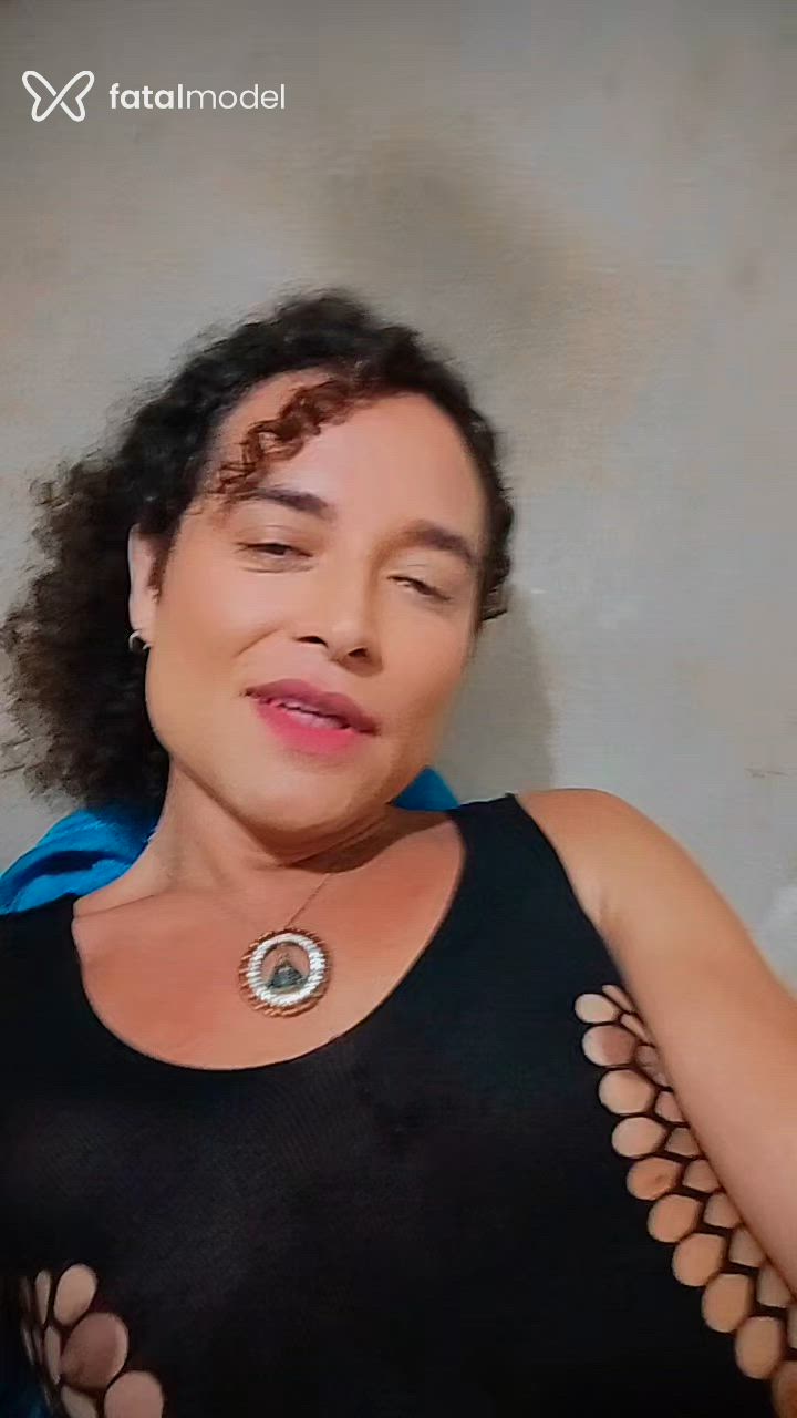 Acompanhante mulher trans com cabelo castanho de olhos mel - Cassie