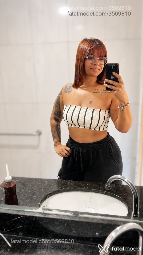 Acompanhante mulher ruiva (o) de olhos castanhos - Cristina