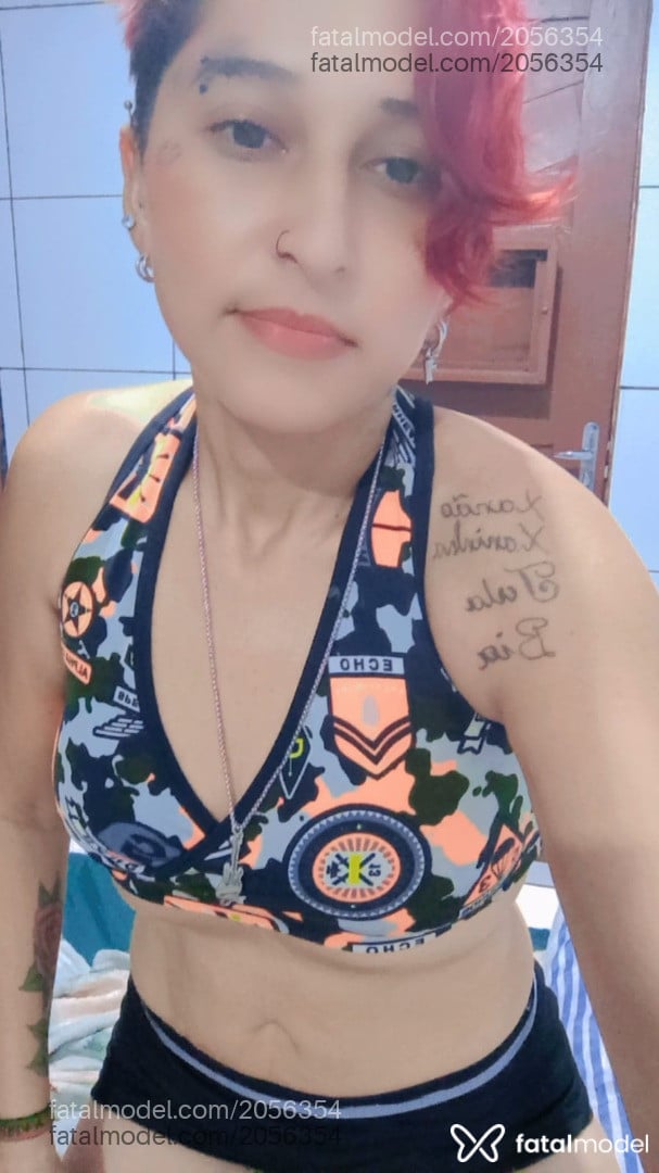 Acompanhante mulher ruiva (o) de olhos castanhos - Talita