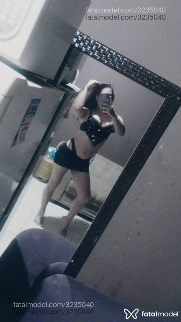 Acompanhante mulher trans com cabelo castanho de olhos castanhos - Thays Orrayo