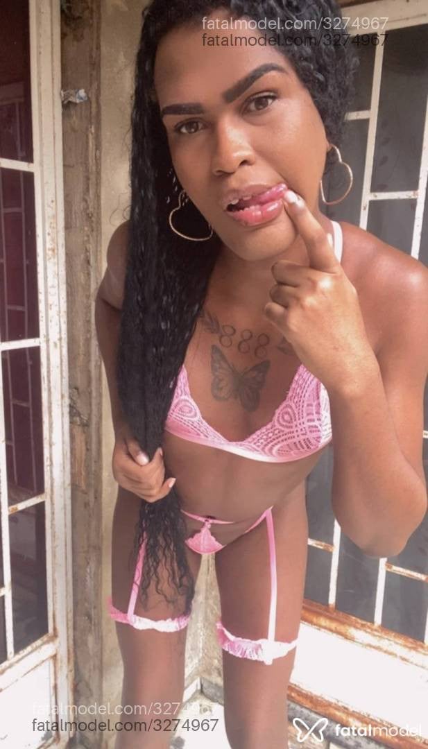 Acompanhante mulher trans morena (o) de olhos castanhos - Luísa