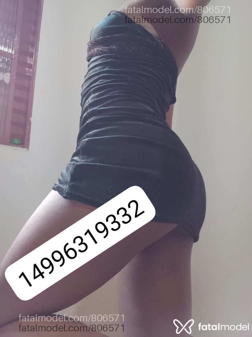Acompanhante mulher trans com cabelo castanho de olhos castanhos - Cacau Pereirah
