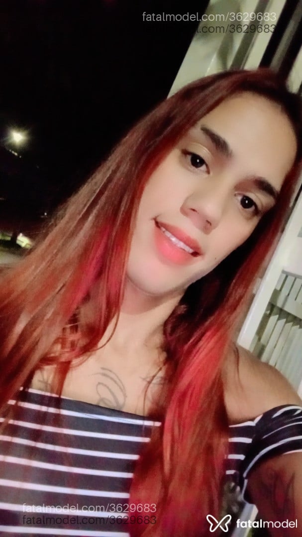 Acompanhante mulher trans ruiva (o) de olhos pretos - Angel