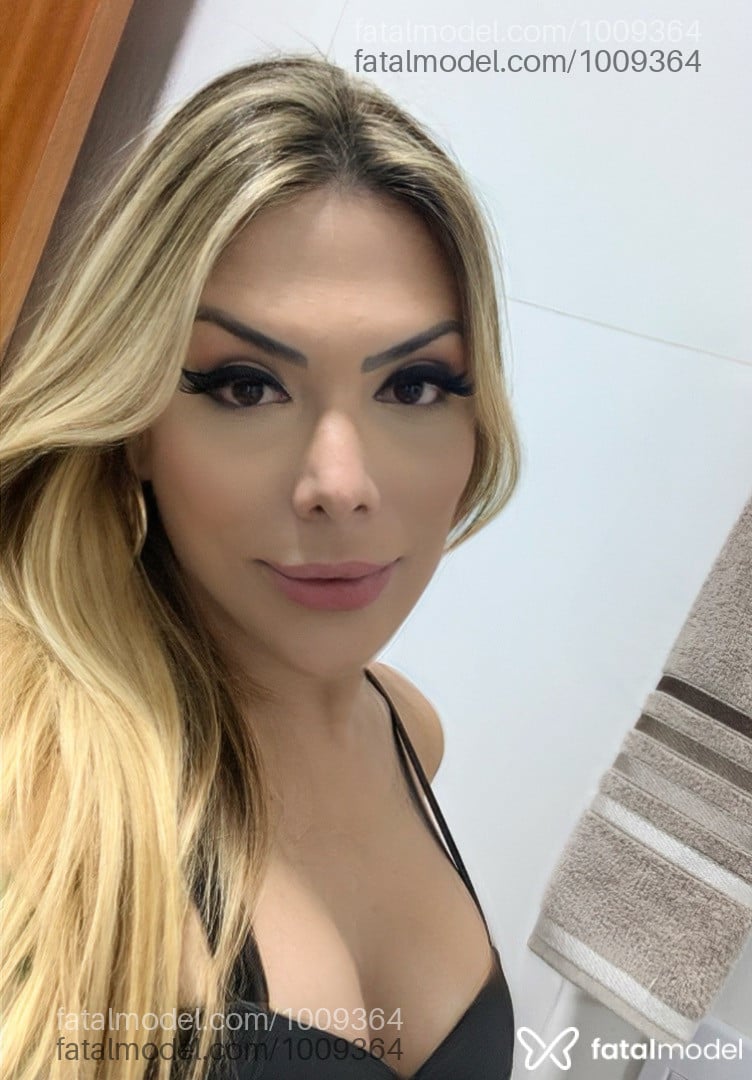 Acompanhante travesti loira (o) de olhos castanhos - Lorena Di Castro