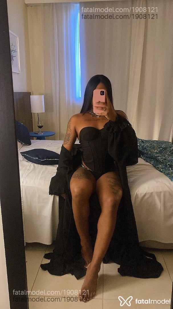Acompanhante mulher trans com cabelo castanho de olhos castanhos - Patricía Veríssimo