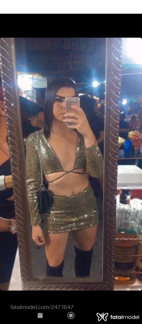 Acompanhante mulher trans com cabelo castanho de olhos verdes - Luanny Moura