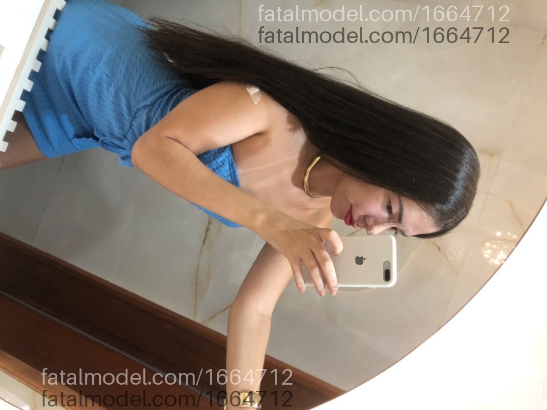 Acompanhante mulher trans com cabelo castanho de olhos castanhos - Lulu