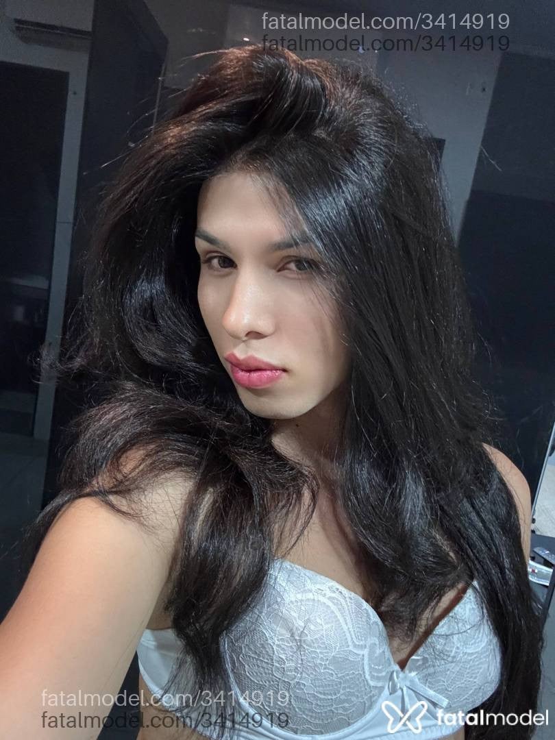 Acompanhante mulher trans com cabelo castanho de olhos castanhos - Jade Castilho