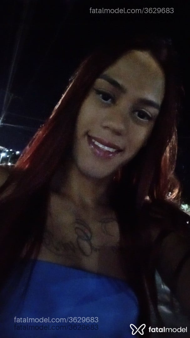Acompanhante mulher trans ruiva (o) de olhos pretos - Angel