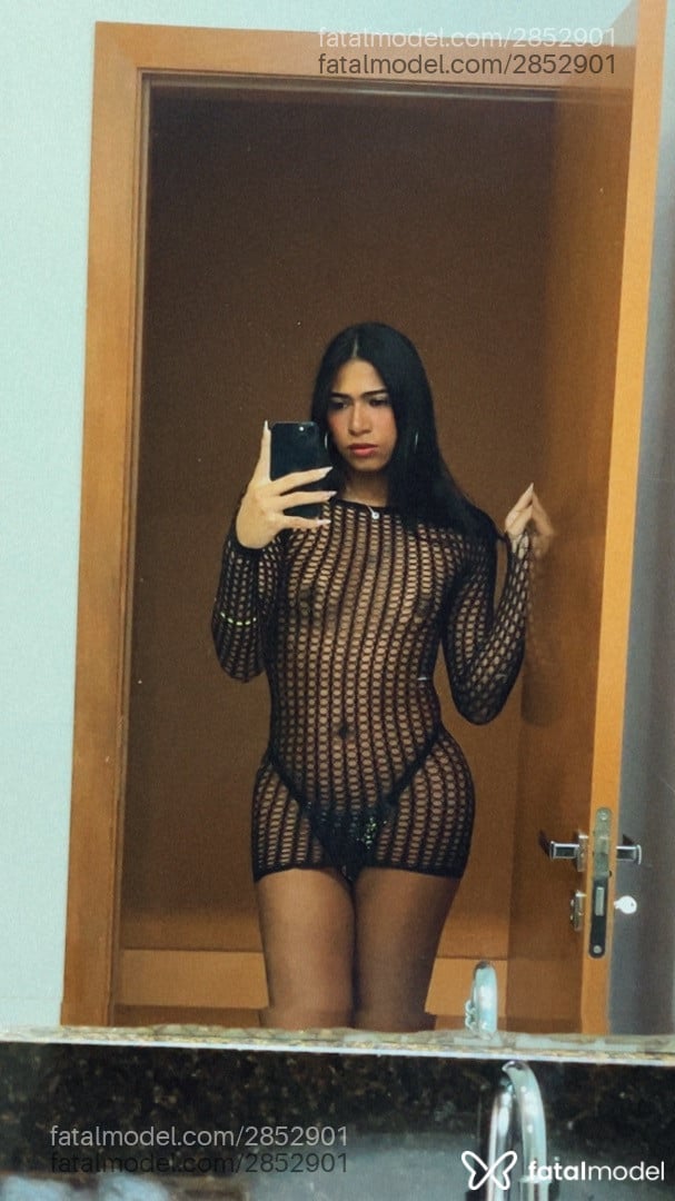Acompanhante mulher trans morena (o) de olhos castanhos - Rafaella Duarte