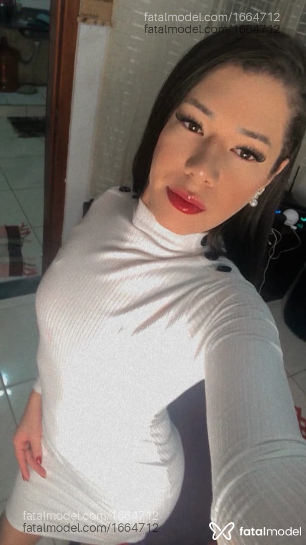 Acompanhante mulher trans com cabelo castanho de olhos castanhos - Lulu