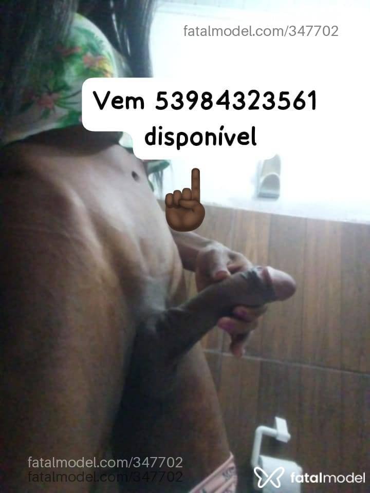 Acompanhante mulher trans morena (o) de olhos castanhos - Majuu