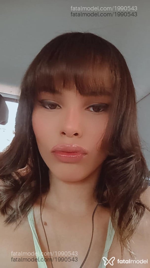 Acompanhante mulher trans com cabelo castanho de olhos mel - Afrodite