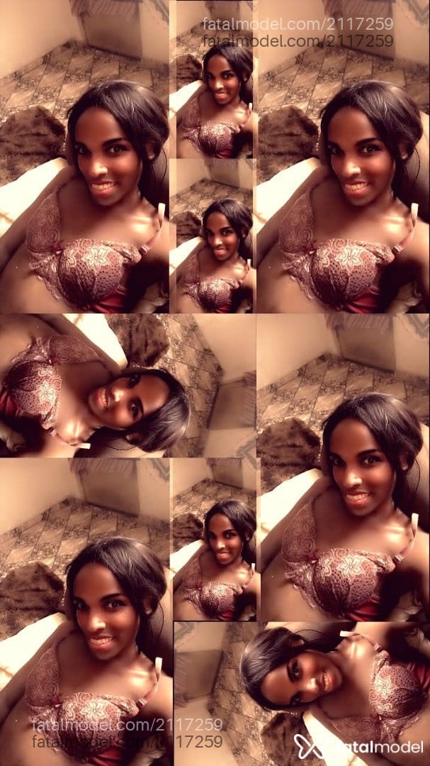 Acompanhante mulher trans com cabelo castanho de olhos pretos - Geeh Queiroz