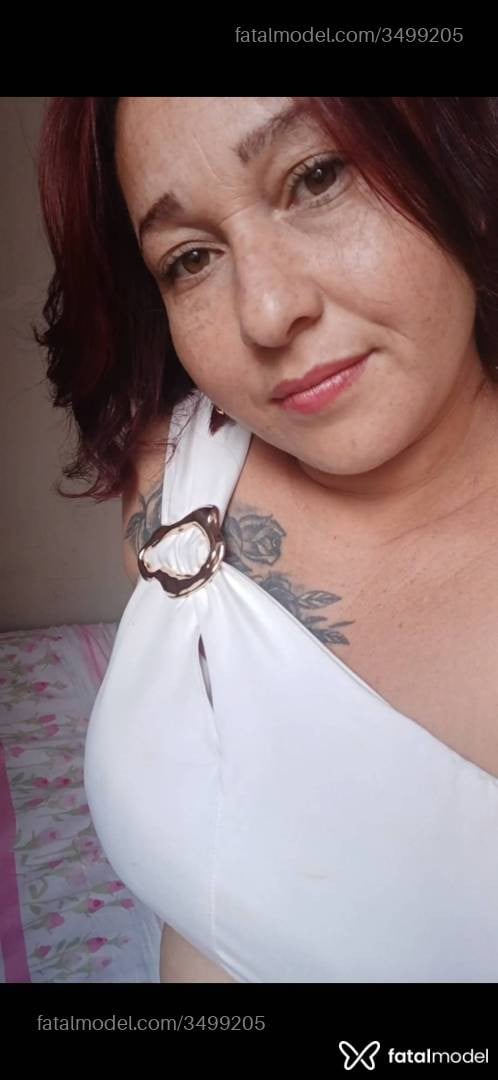 Acompanhante mulher ruiva (o) de olhos mel - Maya