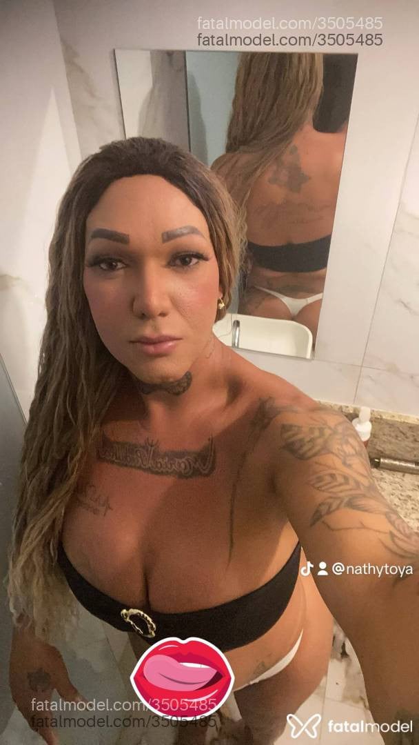 Acompanhante mulher trans ruiva (o) de olhos castanhos - Lhunna