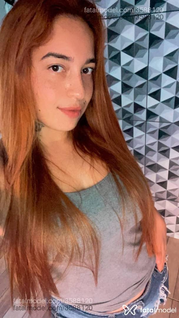 Acompanhante mulher ruiva (o) de olhos castanhos - Leticia
